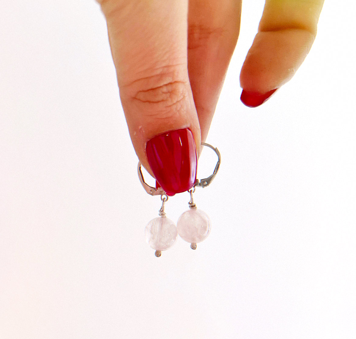 Orecchini a forma di piuma placcati in oro rosa: pendente con Orecchini a forma di piuma placcati in oro rosa: pendente con