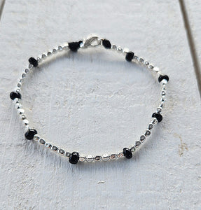 G.K3010 - Bracciale Argento 925 elementi neri a goccia