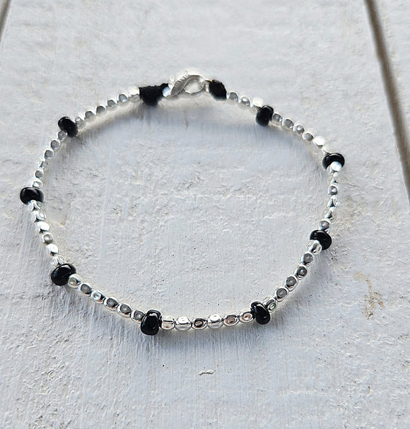 G.K3010 - Bracciale Argento 925 elementi neri a goccia