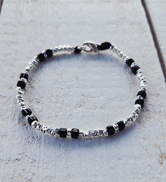 G.K3110 - Bracciale Argento 925 elementi neri e granelli